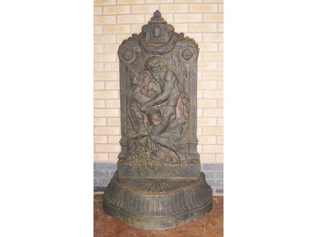 Appraisal: A cast iron garden wall Water Feature moulded with a