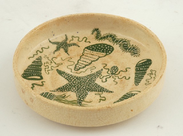 Appraisal: CARL COOPER Victoria circa Circular earthenware dish decorated with sea