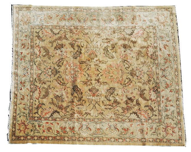 Appraisal: A TABRIZ PASTEL GROUND CARPET all over foliate decoration within