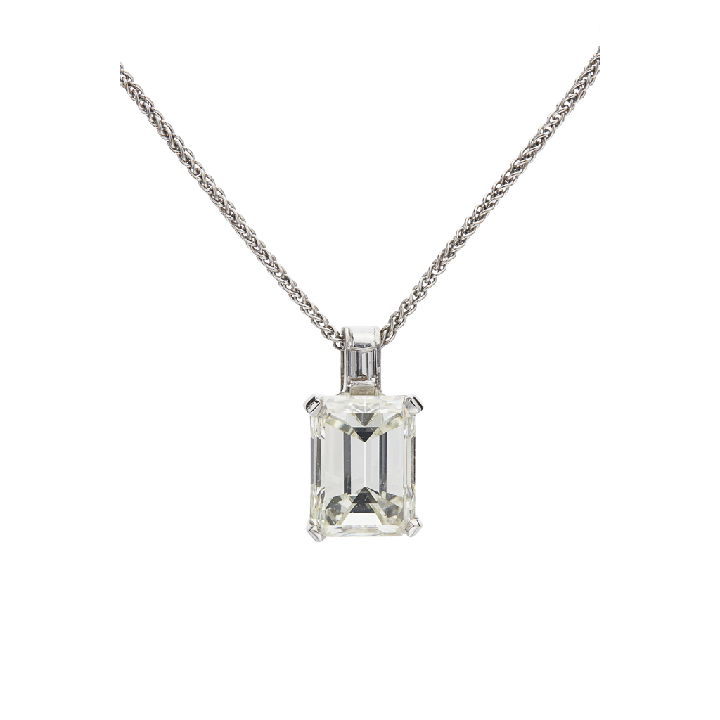 Appraisal: A diamond set pendantclaw set with a single trap cut