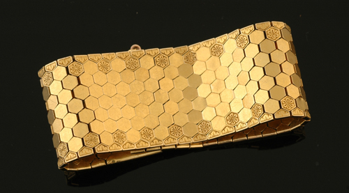 Appraisal: A gold cocktail bracelet Circa The ct gold wide plain