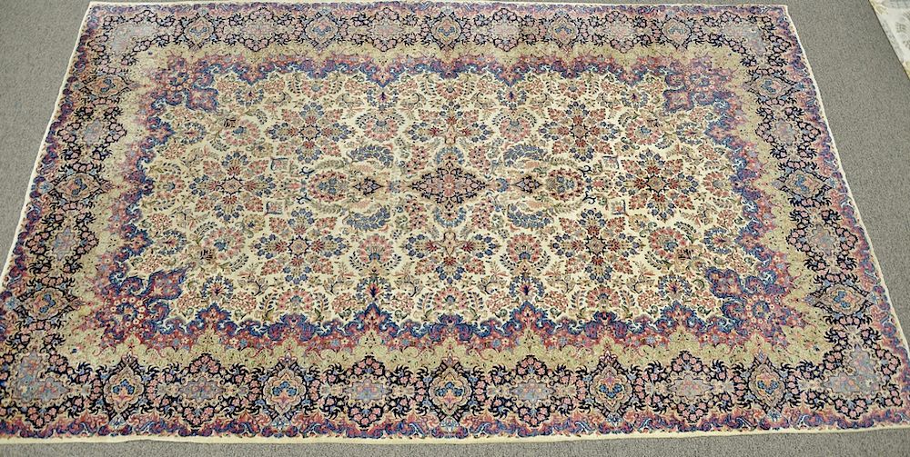 Appraisal: Kirman Oriental carpet wear ' x ' Kirman Oriental carpet