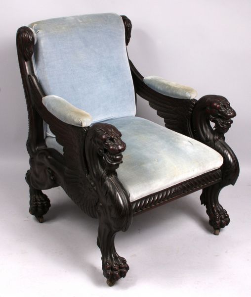 Appraisal: th Century heavily carved and upholstered Chinese armchair with tiger