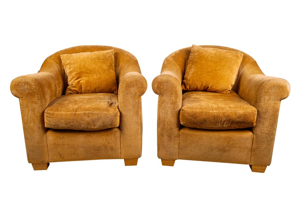 Appraisal: PAIR OF MICHAEL SMITH UPHOLSTERED CLUB CHAIRScovered with caramel-colored fabric