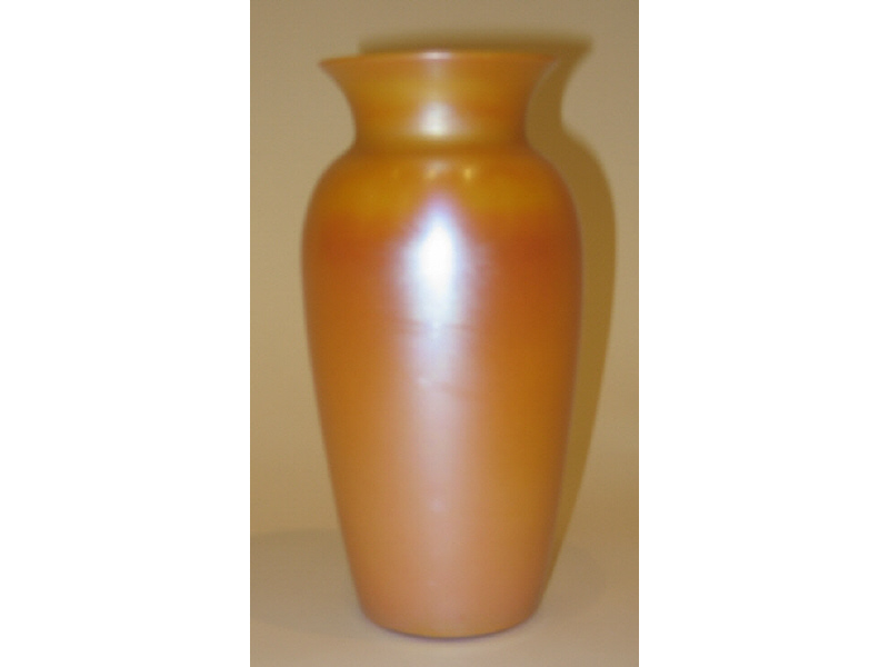 Appraisal: DURAND Orange iridescent vase with flared rim unsigned h Estimate