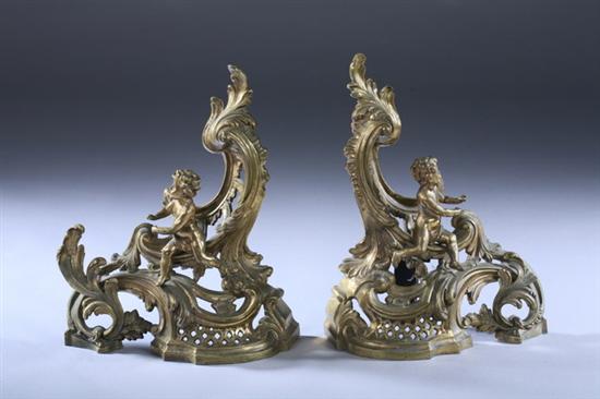 Appraisal: PAIR CONTINENTAL GILT-BRONZE CHENETS th century Openwork scrolling foliate form