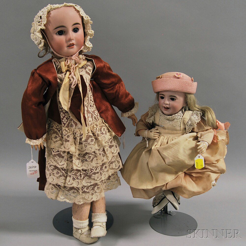 Appraisal: Two French Bisque Head Dolls early th century baby incised