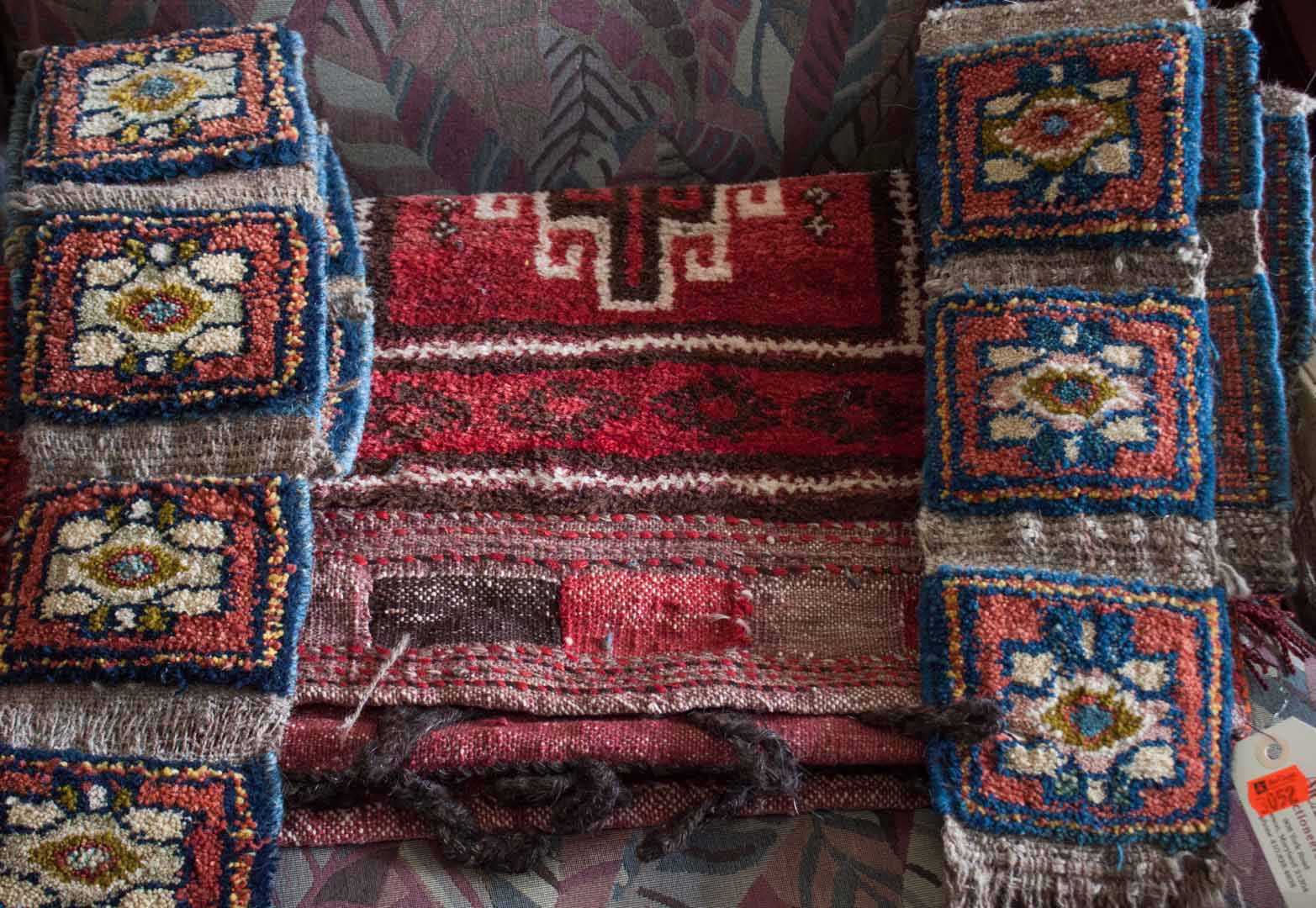 Appraisal: Three textiles including two wall hangings and a saddle bag