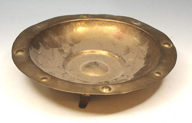 Appraisal: AN ARTS AND CRAFTS BEATEN BRASS CIRCULAR ALMS DISH with