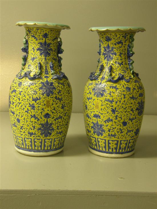 Appraisal: Pair of Chinese yellow ground vases late th century enamelled