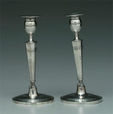 Appraisal: Pair Italian silver candlesticks square columns mounted on claw feet