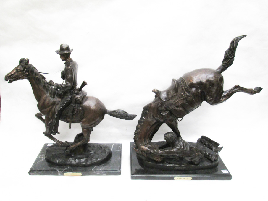 Appraisal: TWO PATINATED BRONZE SCULPTURES after Frederic Remington of horse and