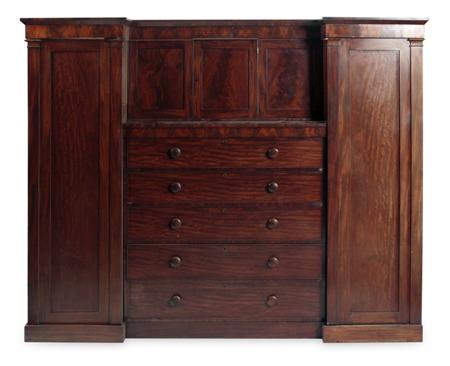 Appraisal: A Victorian mahogany inverted breakfront wardrobe the projected moulded cornice