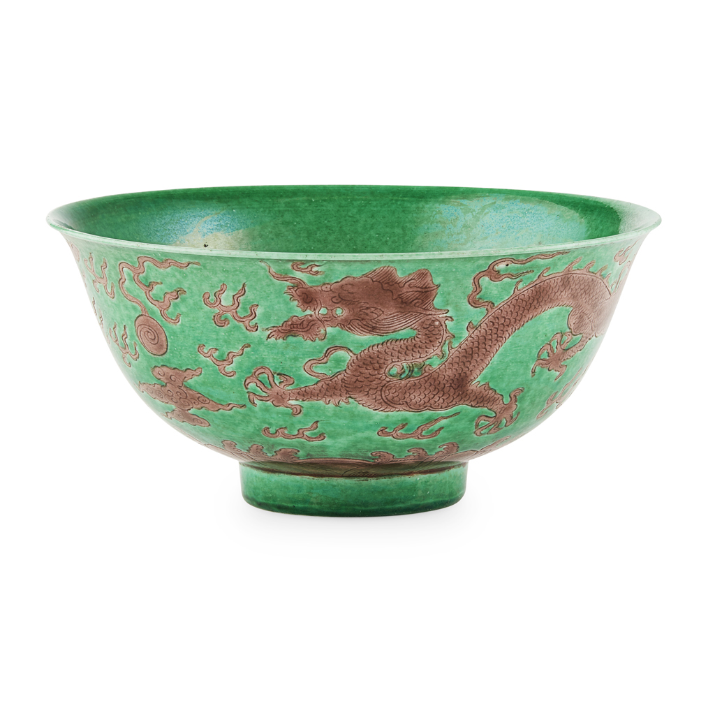 Appraisal: AUBERGINE-ENAMELLED GREEN-GROUND 'DRAGON' BOWL the exterior finely incised and enamelled