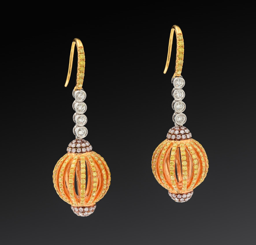 Appraisal: K DANGLING CAGE DIAMOND EARRINGS Yellow gold ball shaped cage