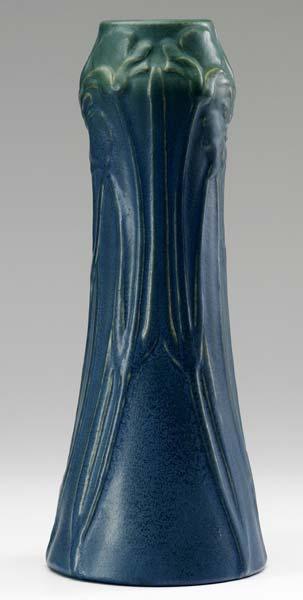 Appraisal: VAN BRIGGLE Tall and early vase heavily embossed with tall