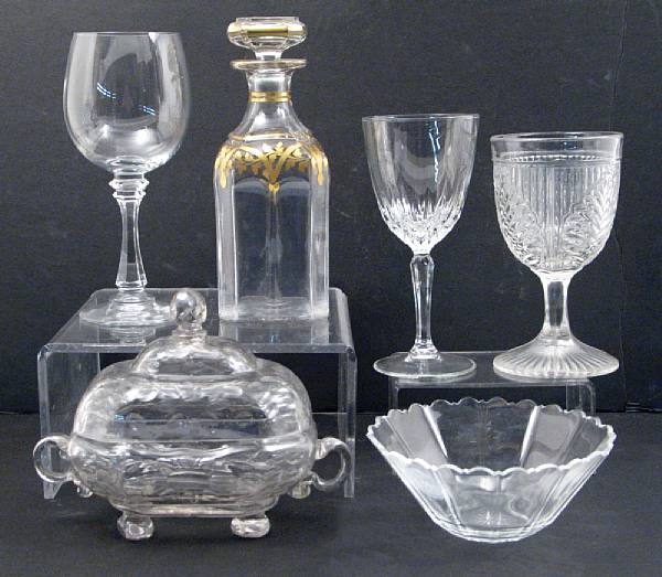 Appraisal: A group of glass table articles comprising a Bohemian decanter