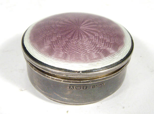 Appraisal: Circular silver pill box with lilac and white enamelled top