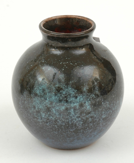 Appraisal: ERIC JUCKERT New South Wales Globular earthenware vase mottled black