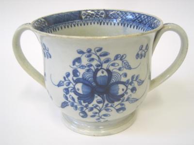 Appraisal: A PEARLWARE LOVING CUP of baluster form with everted rim