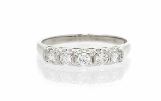 Appraisal: A Karat White Gold Diamond Ring containing five round brilliant