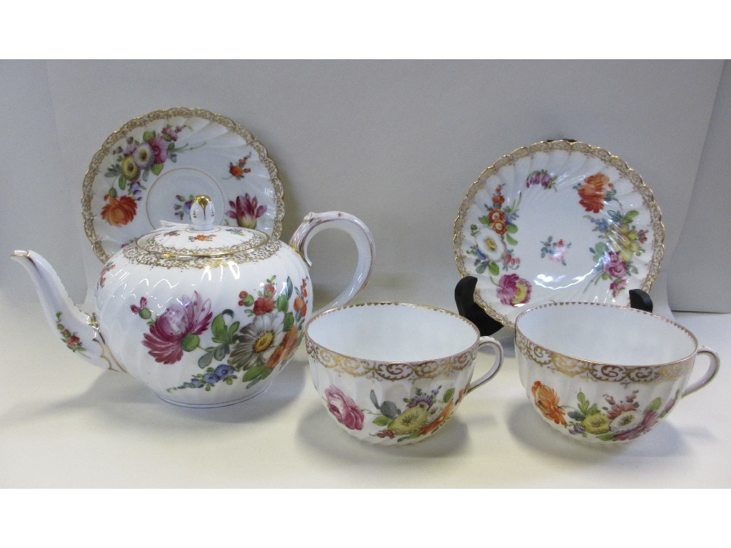 Appraisal: Dresden teapot spout def and two cups saucers