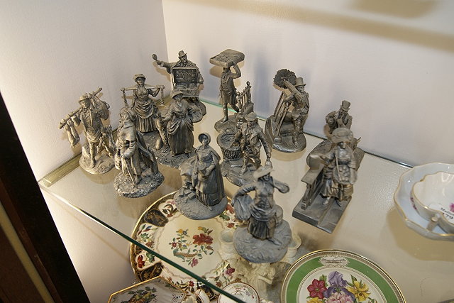 Appraisal: A COLLECTION OF ELEVEN PEWTER MODELS OF FIGURES taken from