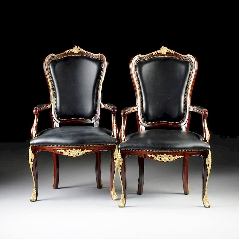 Appraisal: A PAIR OF ROCOCO REVIVAL STYLE GILT BRONZE MOUNTED MAHOGANY