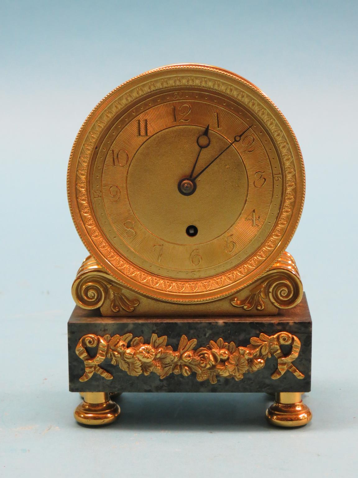 Appraisal: An early th century gilt-brass mantel clock circular dial engine-turned