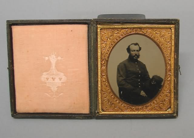 Appraisal: Sixth plate tintype of a Civil War soldier wearing nine-button