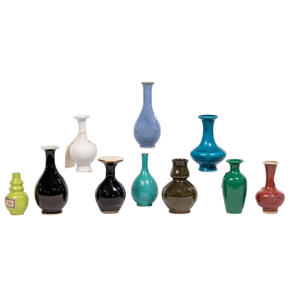 Appraisal: CHINESE POTTERY VASE ASSORTMENT bud vases in various shapes colors