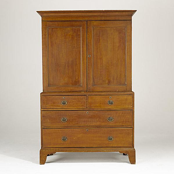 Appraisal: AMERICAN LINEN PRESSGrain-painted two over three drawer configuration bracket feet