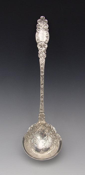 Appraisal: DOMINIC HAFF STERLING PUNCH LADLE IN THE BLOSSOM PATTERN Retailed