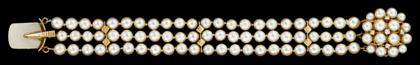 Appraisal: karat yellow gold pearl and diamond braceletTriple pearl strand displaying