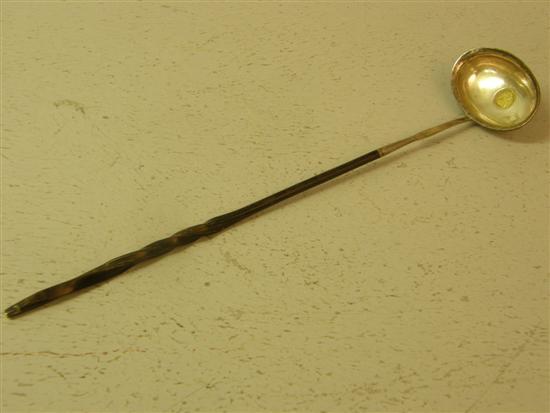 Appraisal: George III white metal punch ladle the oval bowl inset