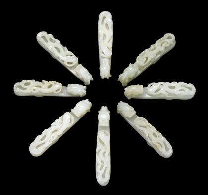 Appraisal: Good Chinese group of eight white jade garment hooks th