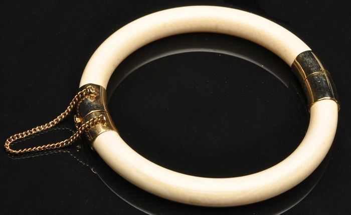 Appraisal: IVORY AND GOLD BANGLE BRACELET Unmarked in outer diam