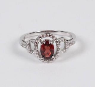 Appraisal: K WHITE GOLD DIAMOND AND GARNET RING K WHITE GOLD