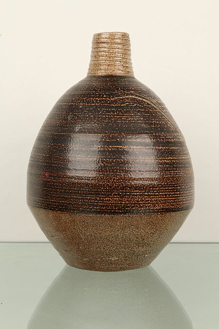 Appraisal: Janet Leach British - at Leach PotteryVasebrown glaze combed decorationimpressed