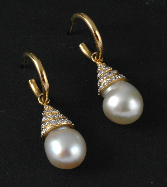 Appraisal: A PAIR OF SOUTH SEA PEARL AND DIAMOND EARRINGS The