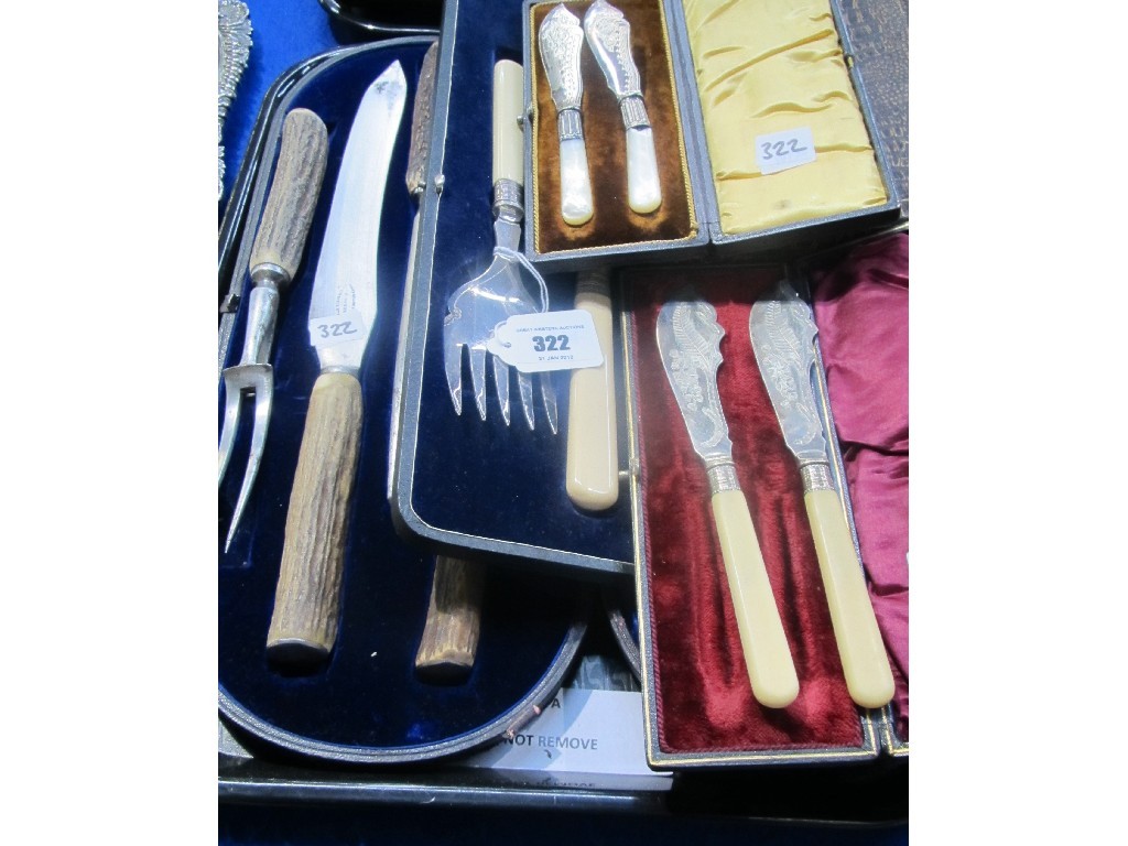 Appraisal: Tray lot of cased cutlery carving set servers butter knives