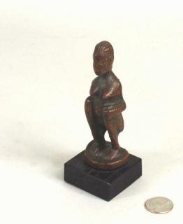 Appraisal: Small Polychromed Bronze Figure African Woman Small polychromed bronze figure