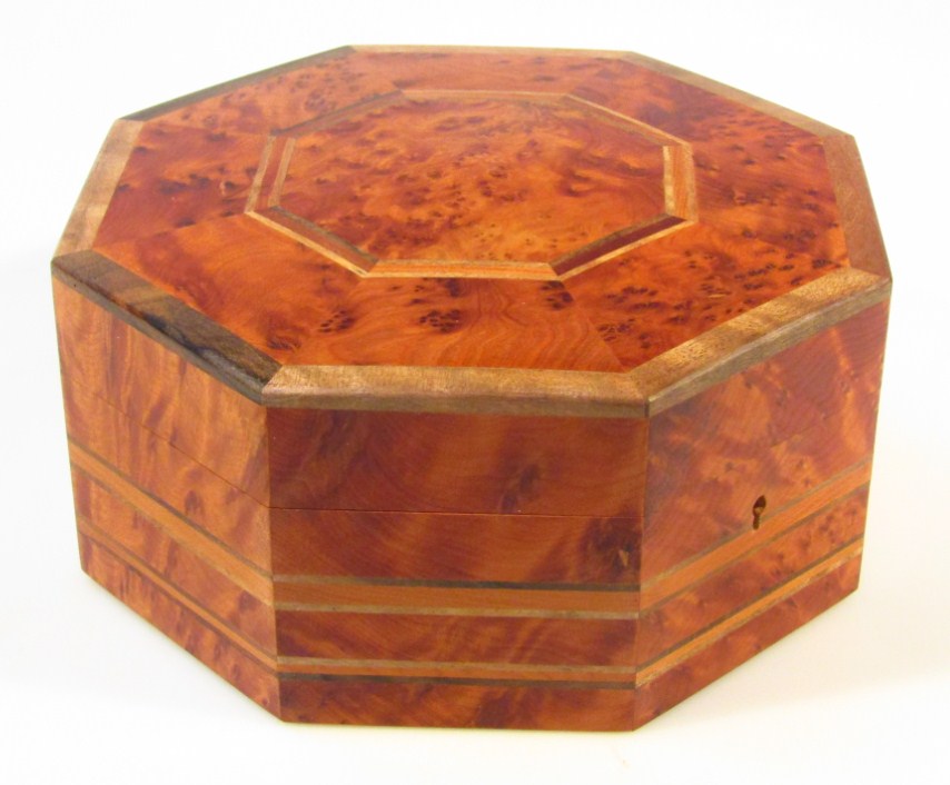 Appraisal: A burr walnut sewing box of octagonal outline inlaid with