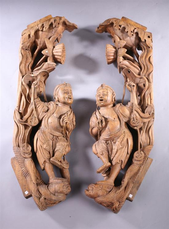 Appraisal: PAIR CHINESE WOOD ARCHITECHTURAL FRAGMENTS Carved to depict two immortals