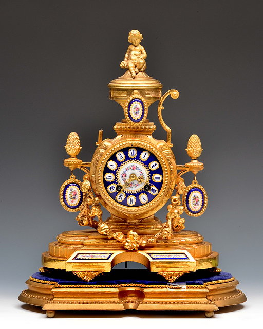 Appraisal: A th Century French gilt metal mantel clock the blue