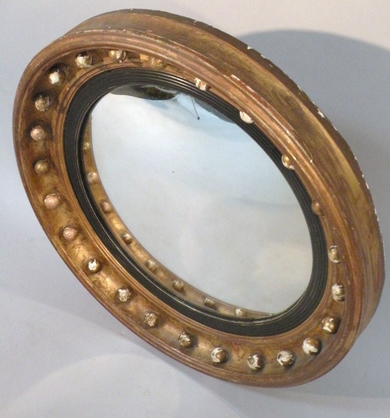 Appraisal: A George IV style gilt wood and plaster convex port