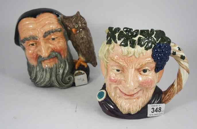 Appraisal: Royal Doulton Large Character Jugs Merlin D and Bacchus D