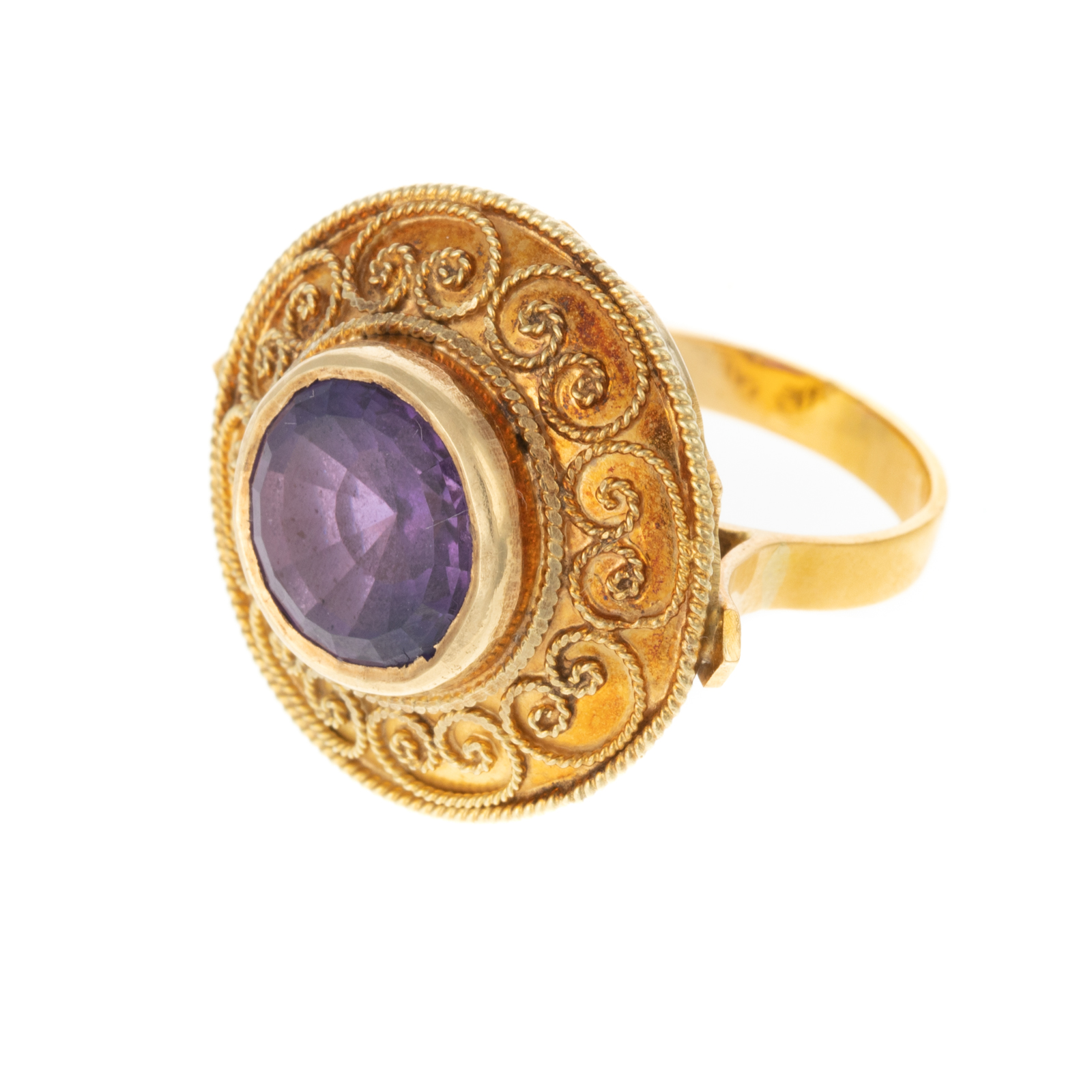 Appraisal: A GRANULATED SCROLL AMETHYST RING IN K K yellow gold