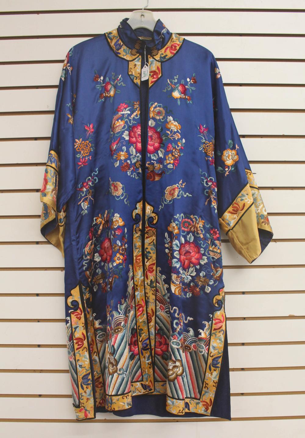 Appraisal: CHINESE EMBROIDERED SILK ROBE hand embroidered in a colorful flowers