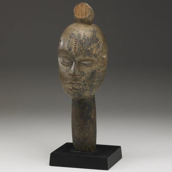 Appraisal: IBO HEAD CREST NIGERIA Serene ancestral image carved from honey-colored